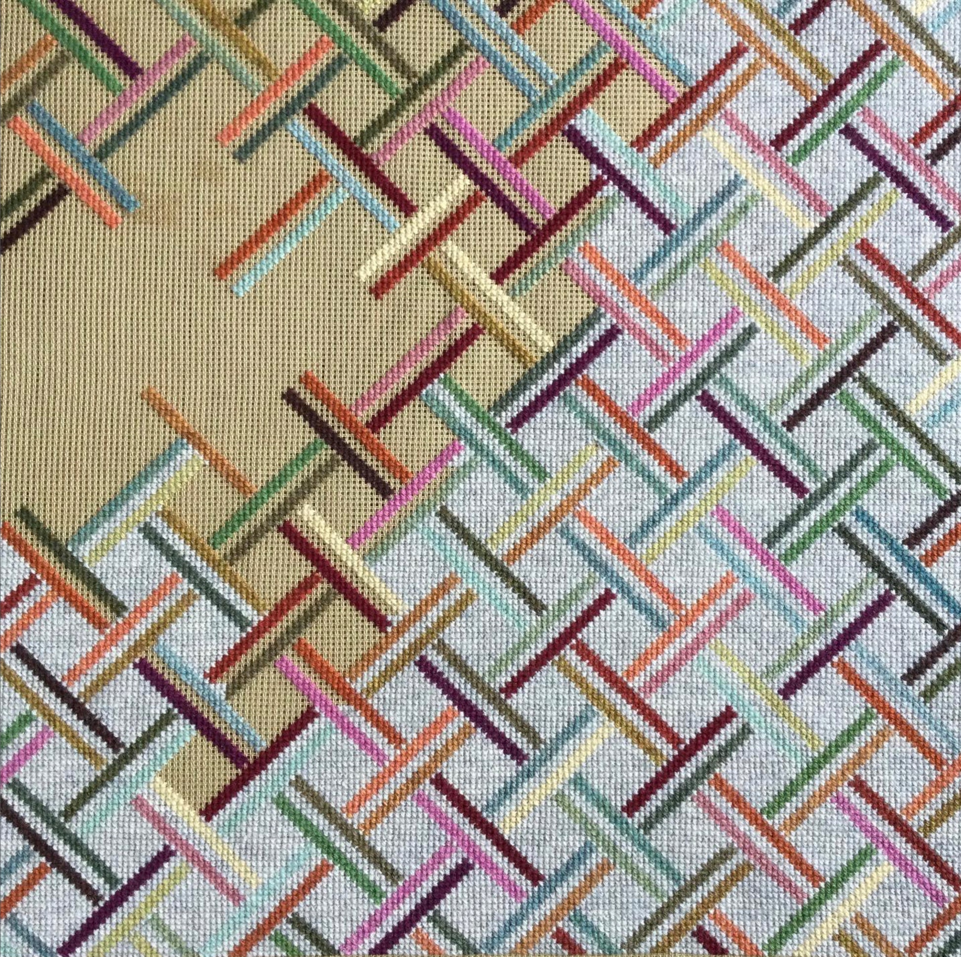 På tværs close up av broderi