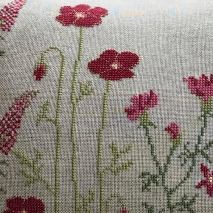 Close up av red flower broderi