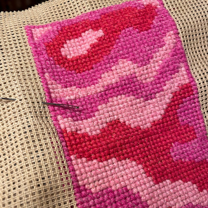 Rosa waves nærbilde av broderi